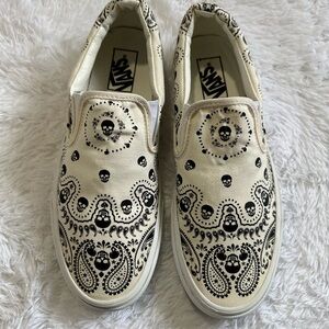 Vans Black Skull and Cream Graphic Slip-Ons